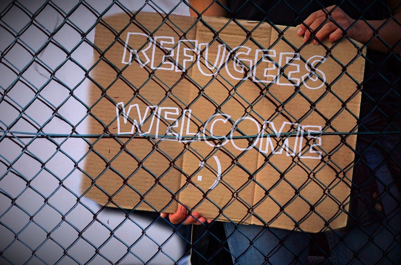Flüchtlinge willkommen Schild