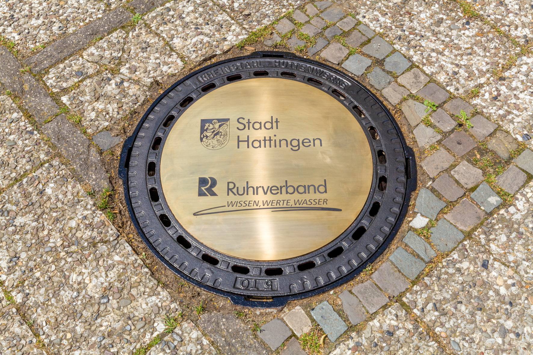 Fotografie eines Kanaldeckels